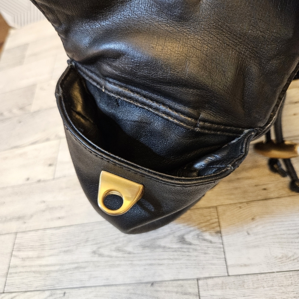 Sabina Black Leather Drawstring Shoulder Bag with Gold Accents - Picture 13 of 16